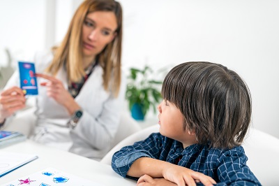 therapist working with a kid